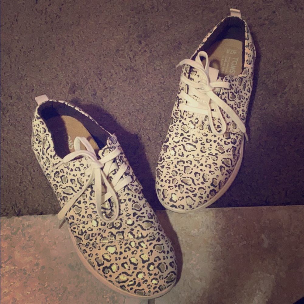 Leopard TOMS gym shoes.